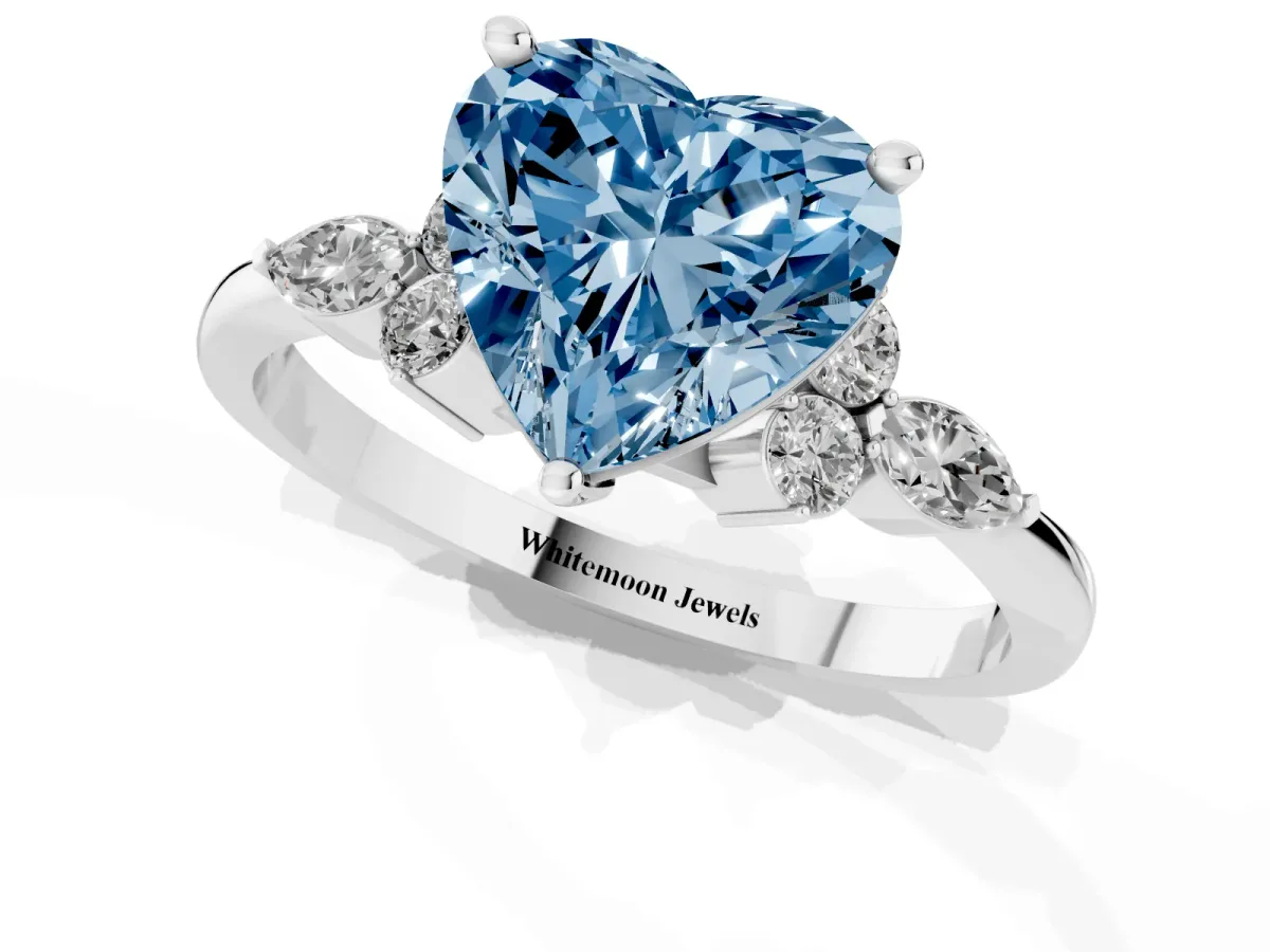 Fancy Blue Heart Cut Brilliant Diamond Solitaire Ring with Pear Side Stones and Four-Prong Setting Silver