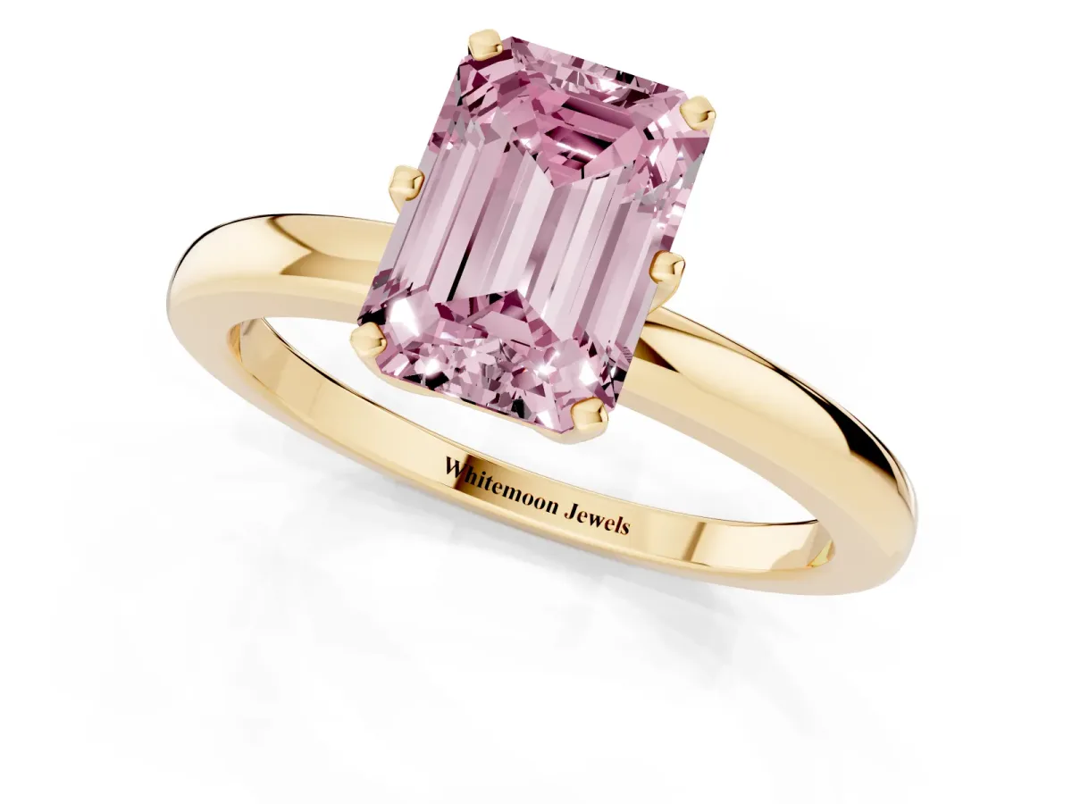 Fancy Pink Emerald Cut Solitaire Diamond Ring with Six-Prong Setting on a Classic Band Yellow gold