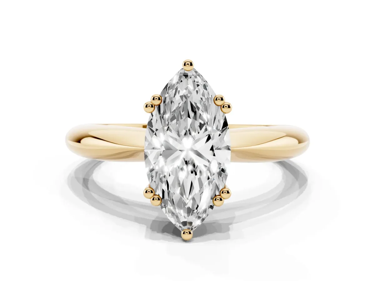 Marquise Cut Cut Solitaire Engagement Ring with Tapered Band and Four-Prong Setting Yellow gold