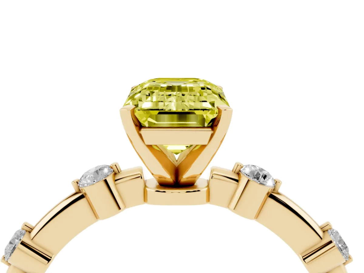 Fancy Yellow Emerald Cut Solitaire Diamond Ring with Bezel Set Side Stones and Prong Setting Yellow gold