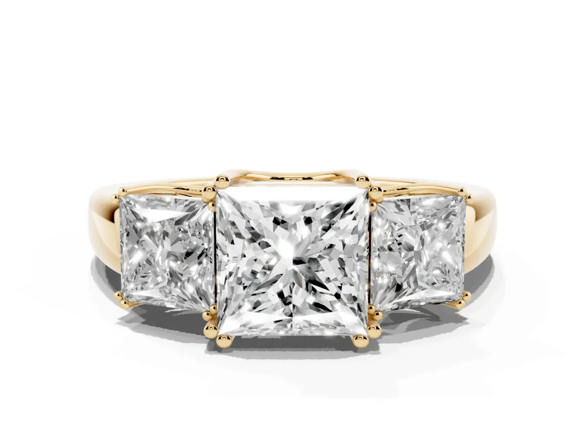 Three-Stone Princess Cut Cut Diamond Ring with Channel Set Band and Four-Prong Setting Yellow gold