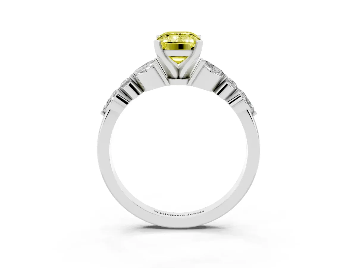 Fancy Yellow Emerald Cut Diamond Solitaire Ring with Side Stones and Four-Prong Setting Platinum