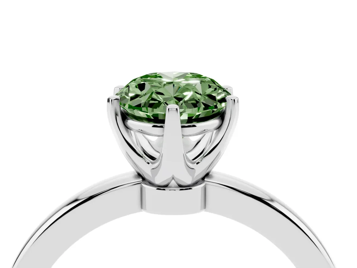 Fancy Green Oval Cut Solitaire Diamond Ring with Six-Prong Setting on a Classic Band Silver