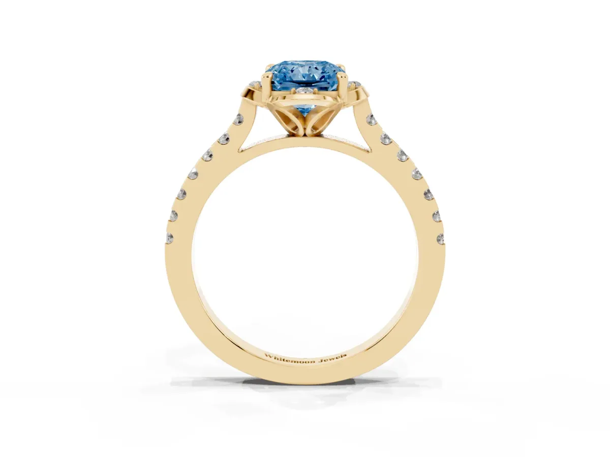 Fancy Blue Radiant Cut Diamond Ring with Pavé Band and Floral Prong Setting Yellow gold