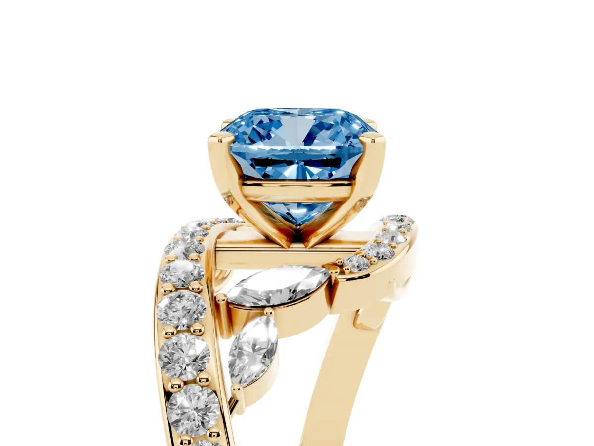 Fancy Blue Cushion Cut Solitaire with Pavé Twist Band and Four-Prong Setting Yellow gold