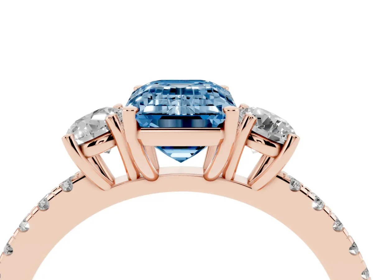 Fancy Blue Three-Stone Emerald Cut Cut Diamond Pavé Band with Prong Setting Rose gold