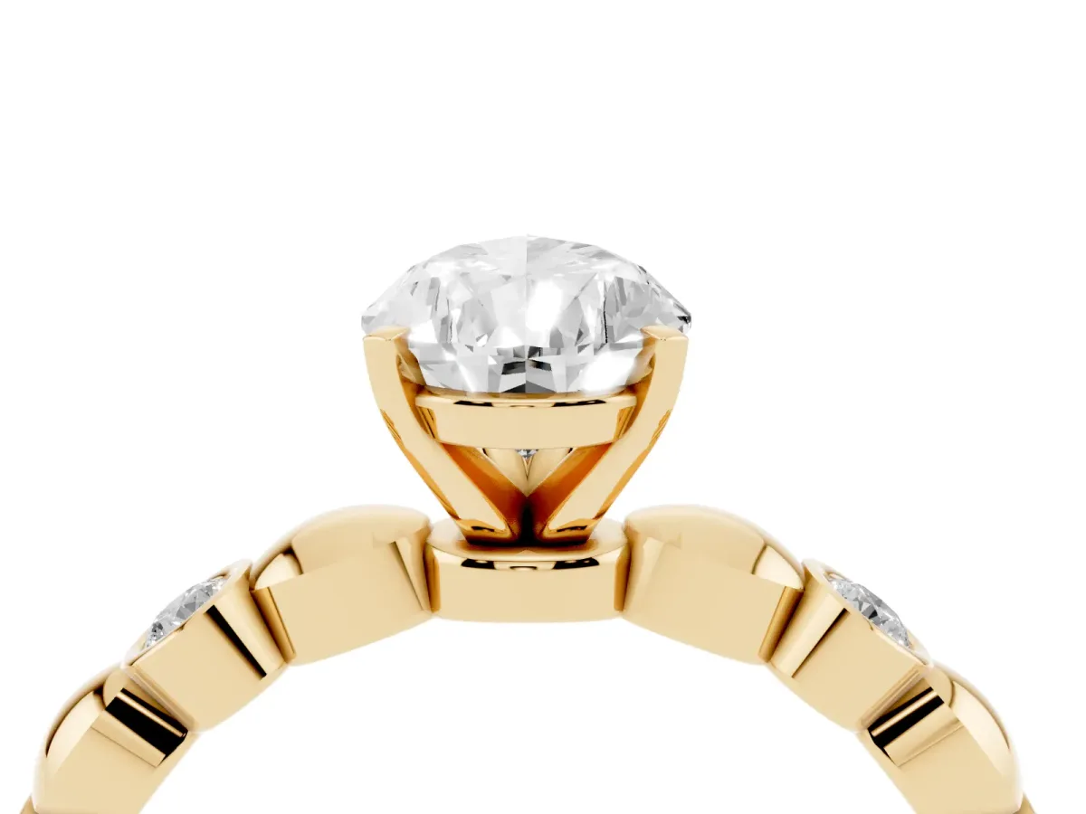 Pear Cut Solitaire Bezel-Set Diamond Ring with Beaded Band and Four-Prong Setting Yellow gold