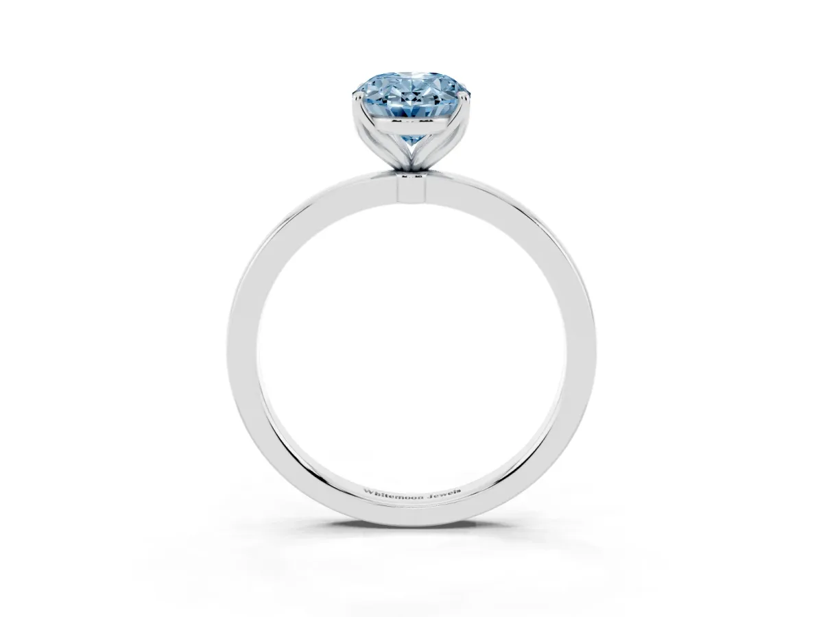 Fancy Blue Oval Cut Diamond Solitaire Ring with Thin Band and Prong Setting Silver