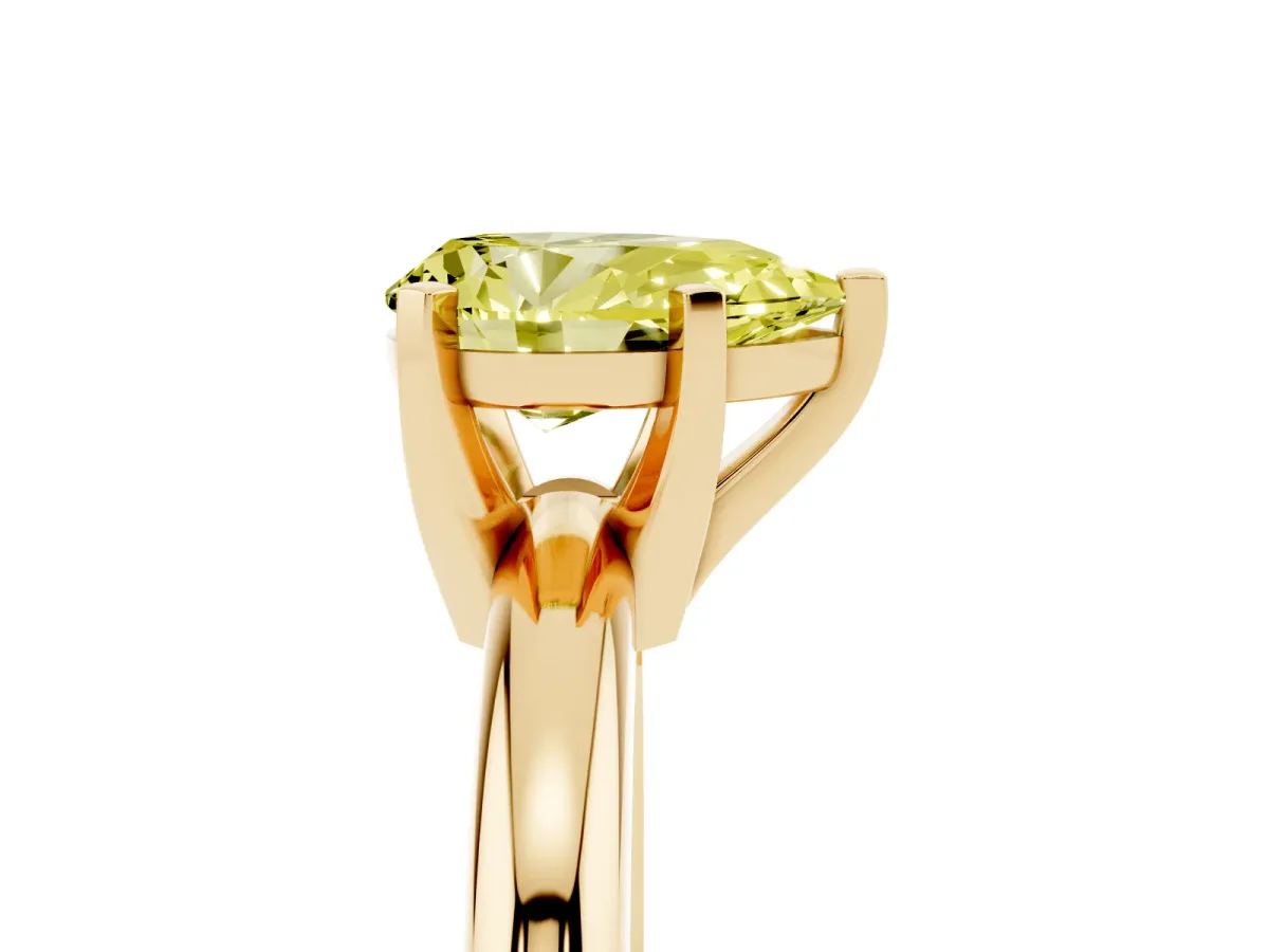 Fancy Yellow Pear Cut Diamond Solitaire Engagement Ring with Round Band and Four-Prong Setting Yellow gold