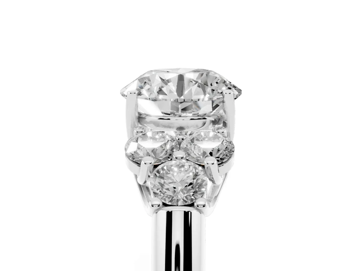 Round Cut Cut Diamond Cluster Ring with Round Accent Stones and Prong Setting on a Classic Band Silver