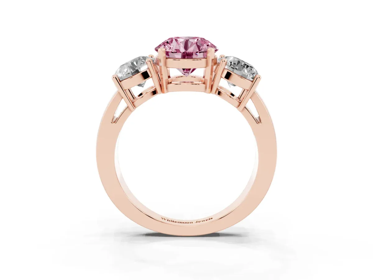 Fancy Pink Three-Stone Round Cut Diamond Ring with Round Side Stones, Classic Band, and Four-Prong Setting Rose gold
