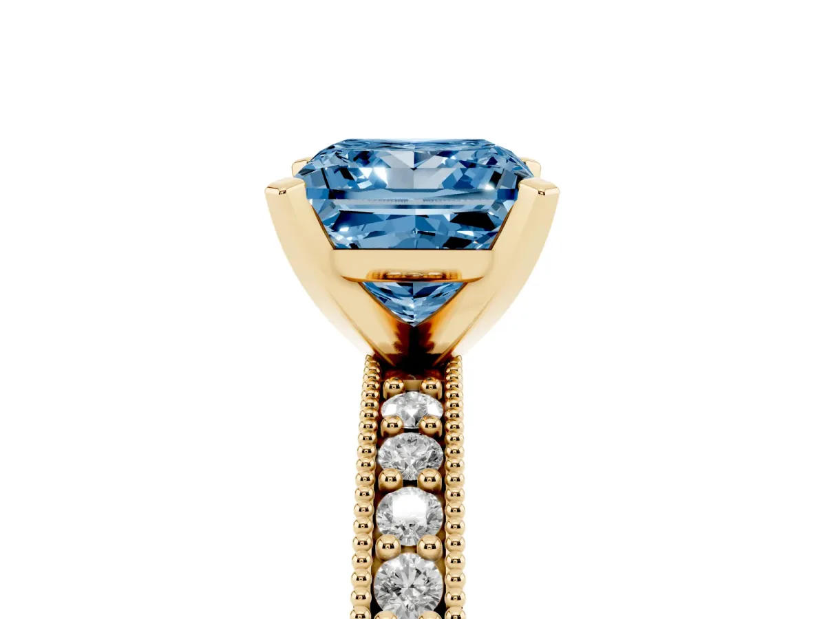 Fancy Blue Princess Cut Diamond Milgrain Pavé Engagement Ring with Four-Prong Setting Yellow gold