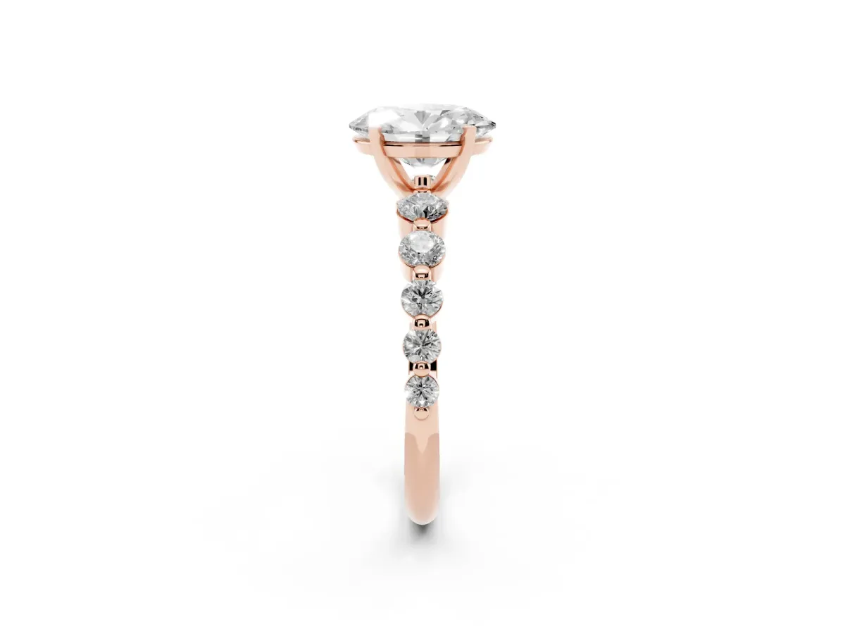 Oval Cut Solitaire Diamond Ring with Pave Band and Four-Prong Setting Rose gold