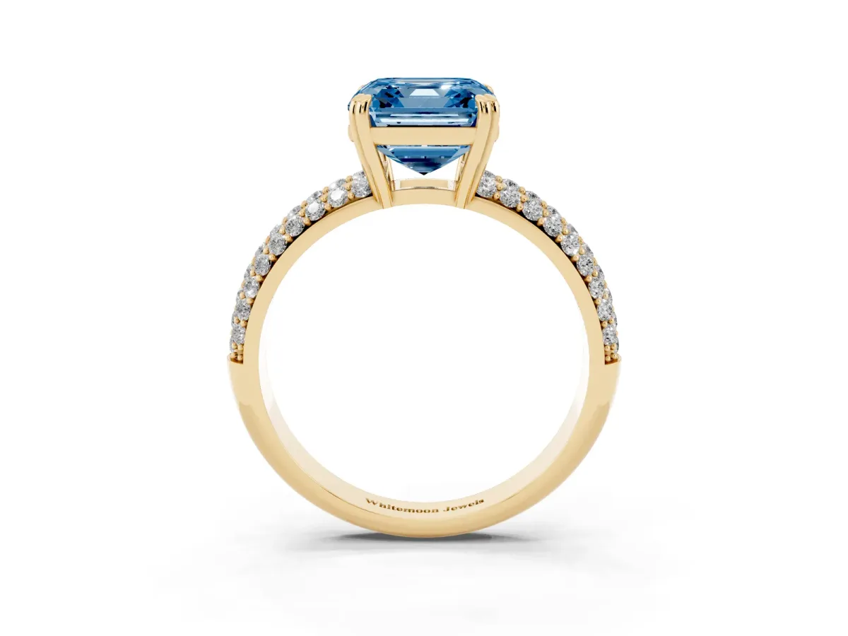 Fancy Blue Asscher Cut Diamond Solitaire Ring with Multi-Row Round Pavé Band and Prong Setting Yellow gold