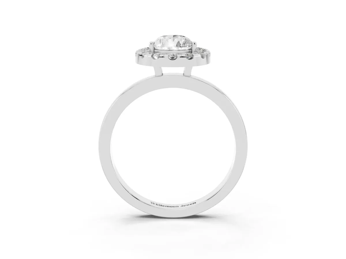 Pear Cut Halo Diamond Solitaire with Pavé Band and Four-Prong Setting Platinum