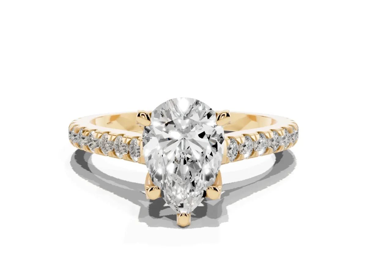 Pear Cut Brilliant Diamond Solitaire with Pavé Band and Four-Prong Setting Yellow gold