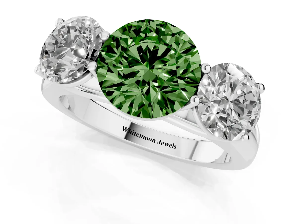 Fancy Green Round Cut Three-Stone Diamond Ring with Prong Setting on a Classic Band Silver
