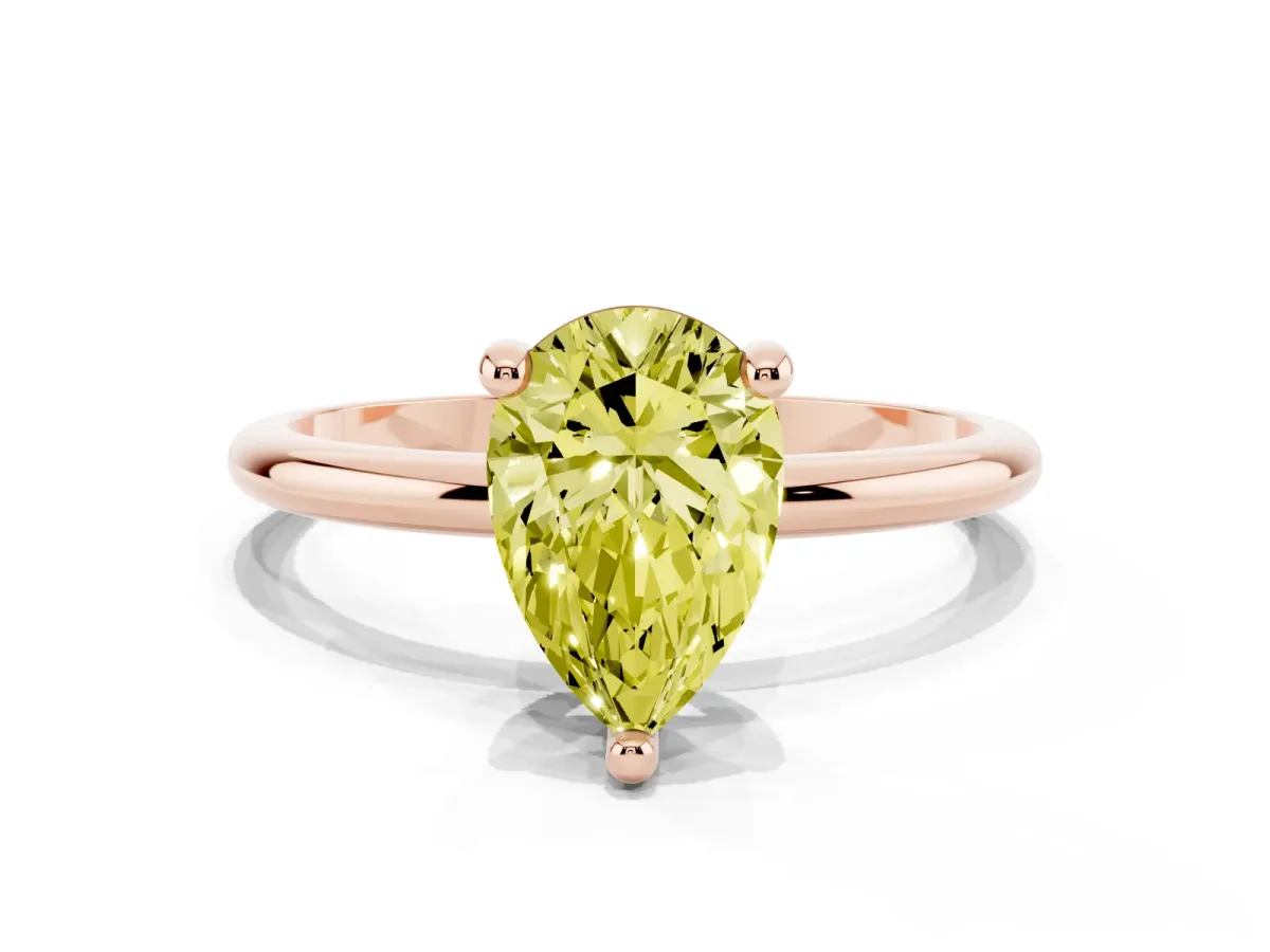Fancy Yellow Pear Cut Solitaire Diamond Ring with 4-Prong Setting on a Classic Band Rose gold