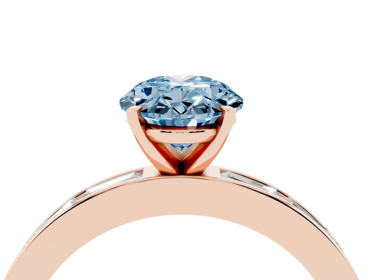 Fancy Blue Oval Cut Solitaire Diamond Ring with Channel-Set Baguette Band and Four-Prong Setting Rose gold
