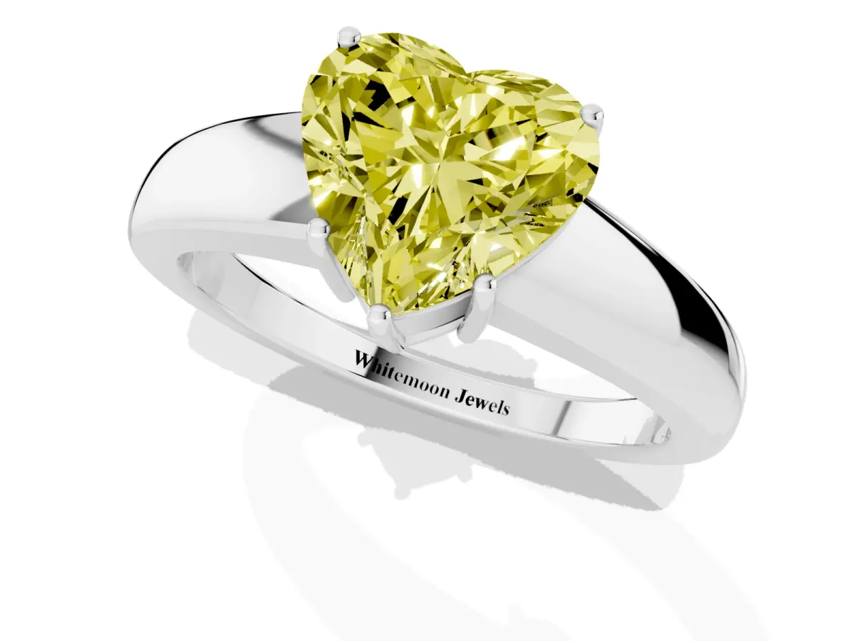 Fancy Yellow Heart Cut Solitaire Diamond Ring with Tapered Band and Four-Prong Setting Silver
