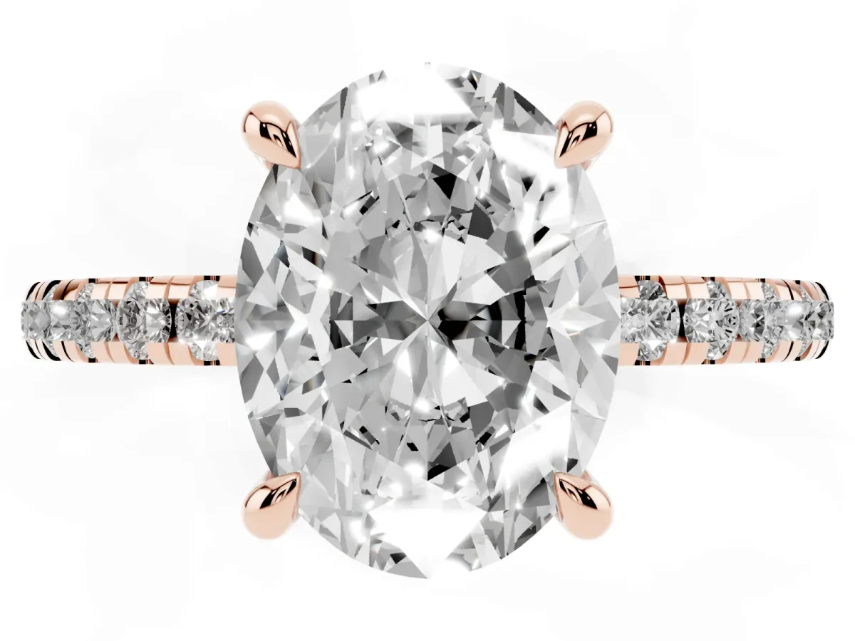 Oval Cut Diamond Brilliant Solitaire Ring with Pavé Band and Four-Prong Setting Rose gold