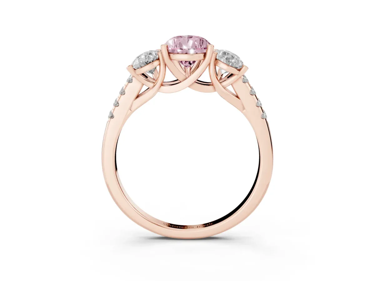 Fancy Pink Three-Stone Pear Cut Diamond Ring with Round Pavé Band and Prong Setting Rose gold