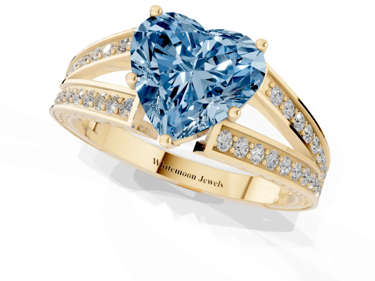 Fancy Blue Heart Cut Diamond Split Shank Ring with Pavé Band and Four-Prong Setting Yellow gold