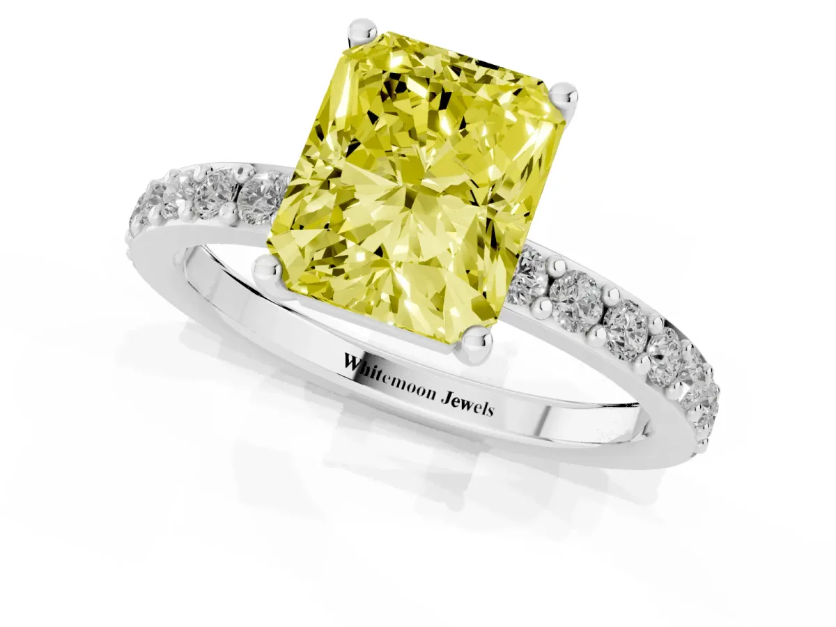 Fancy Yellow Radiant Cut Cut Diamond Solitaire with Pave Band and Four-Prong Setting Platinum