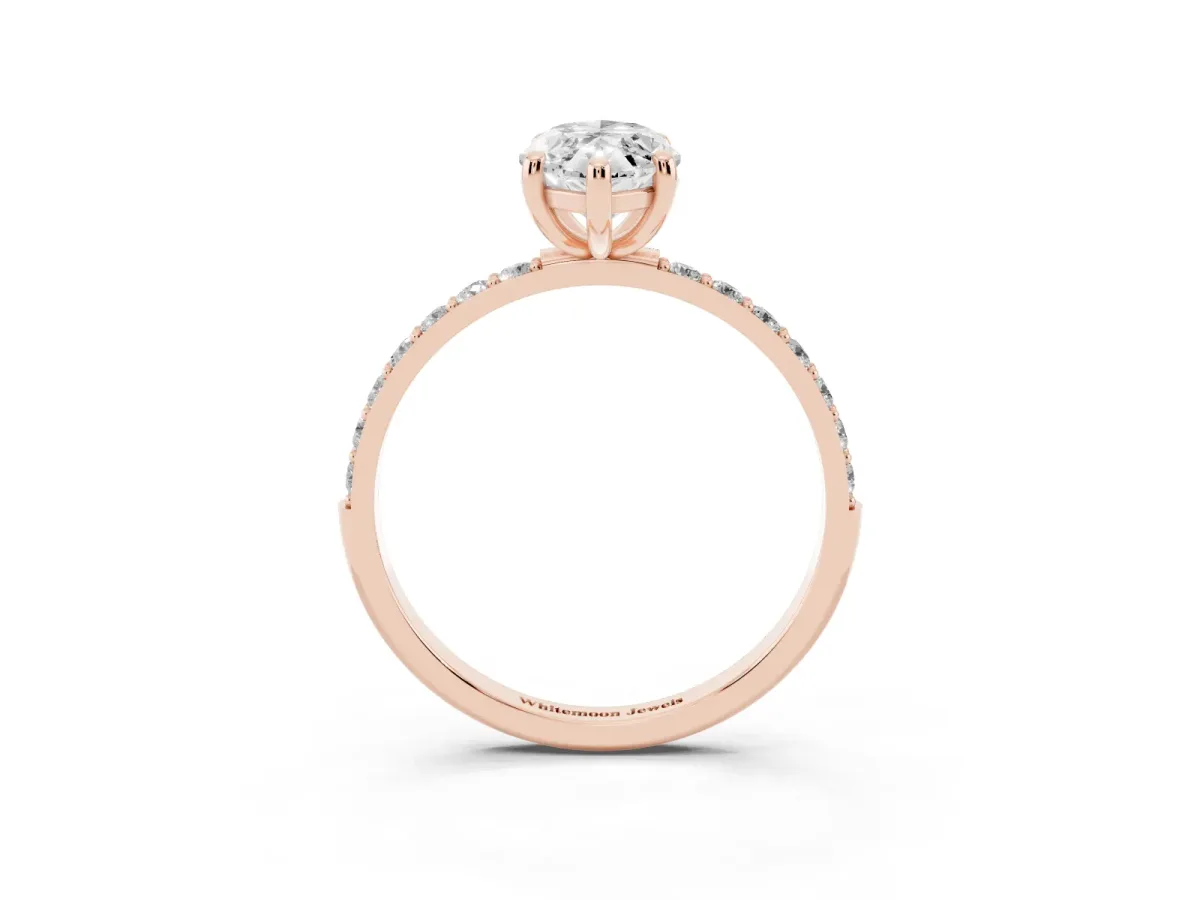 Marquise Cut Diamond Solitaire Ring with Round Pavé Band and Prong Setting Rose gold