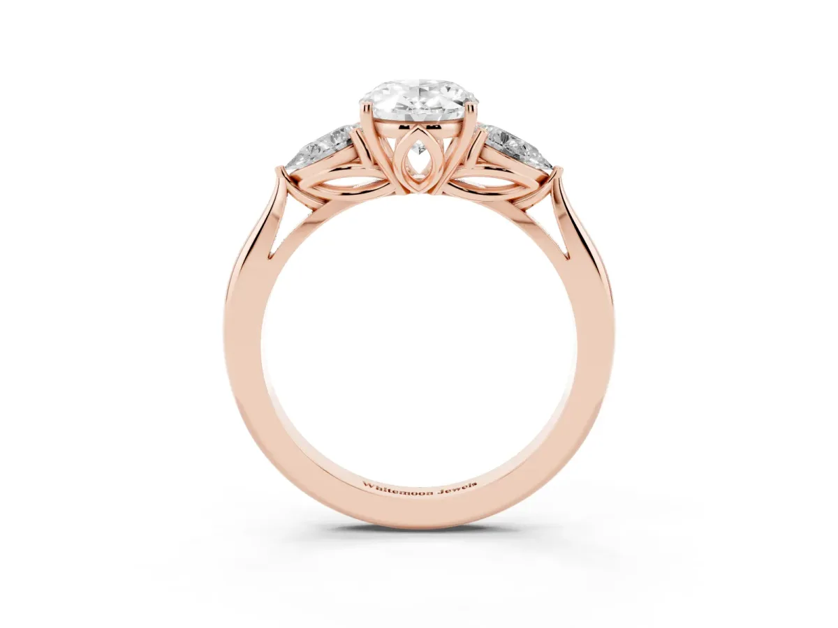 Three-Stone Oval Cut Brilliant Diamond Solitaire Ring with Tapered Band and Four-Prong Setting Rose gold