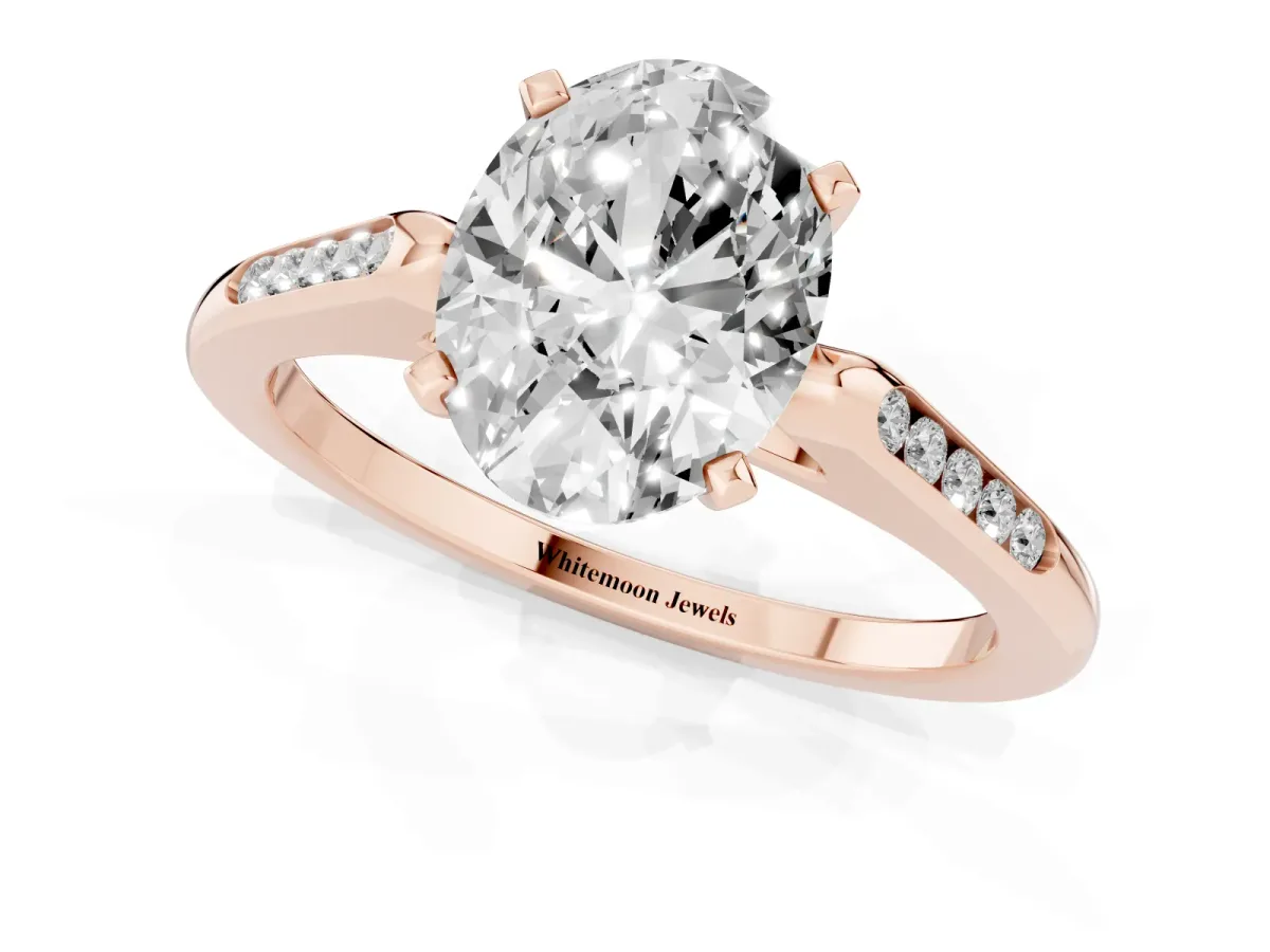 Oval Cut Diamond Solitaire Ring with Channel Set Round Band and Prong Setting Rose gold