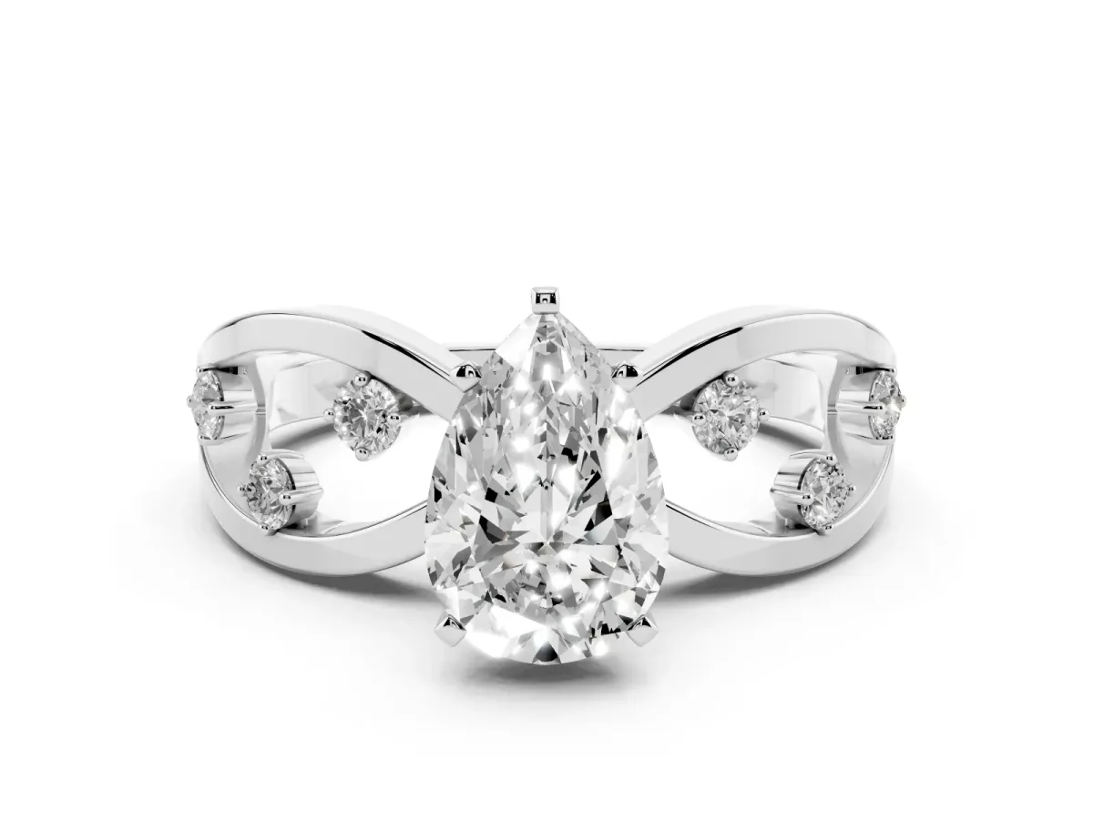Pear Cut Cut Solitaire Diamond with Side Stones on Criss-Cross Band and Four-Prong Setting Silver