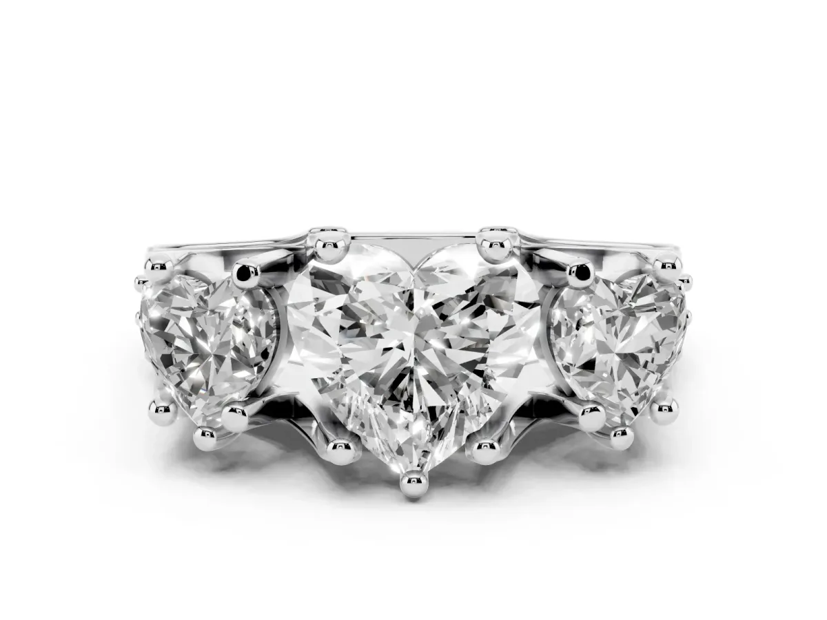 Heart Cut Diamond Three-Stone Ring with Channel Set Band and Four-Prong Setting Silver
