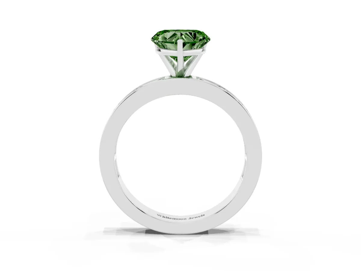Fancy Green Heart Cut Solitaire Diamond Ring with Channel-Set Baguette Band and Four-Prong Setting Platinum