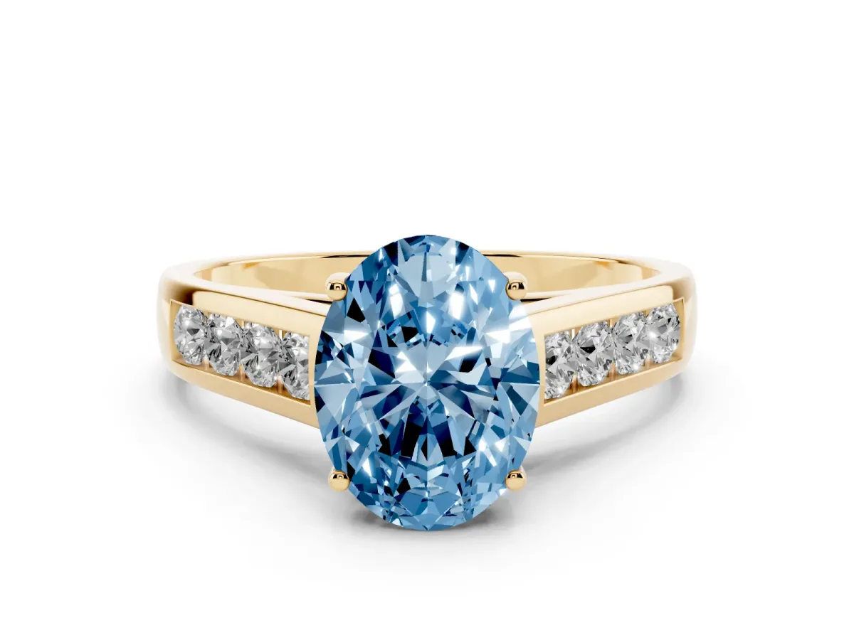 Fancy Blue Oval Cut Solitaire Channel-Set Diamond Engagement Ring with Four-Prong Setting Yellow gold