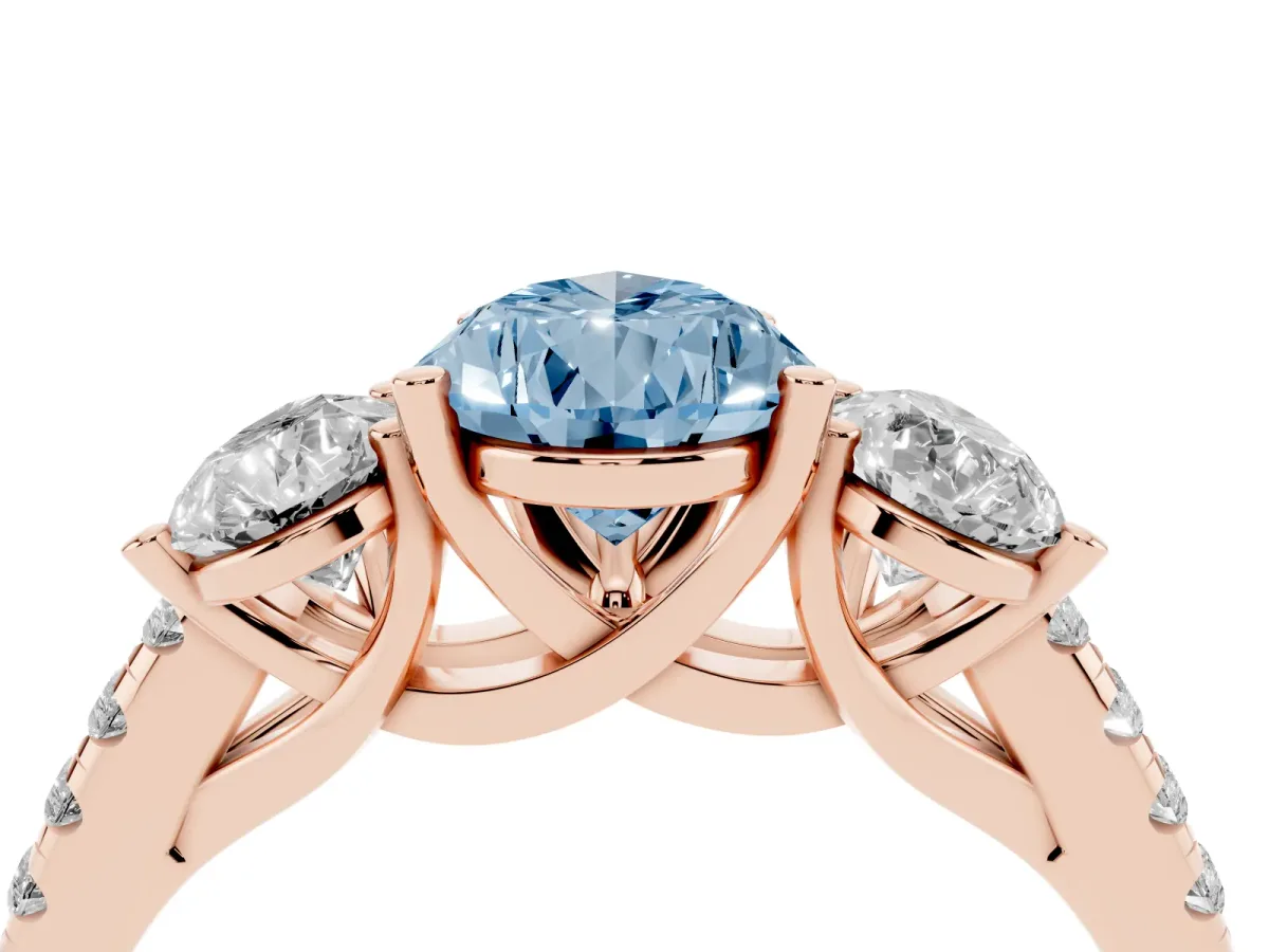 Fancy Blue Three-Stone Pear Cut Diamond Ring with Round Pavé Band and Prong Setting Rose gold