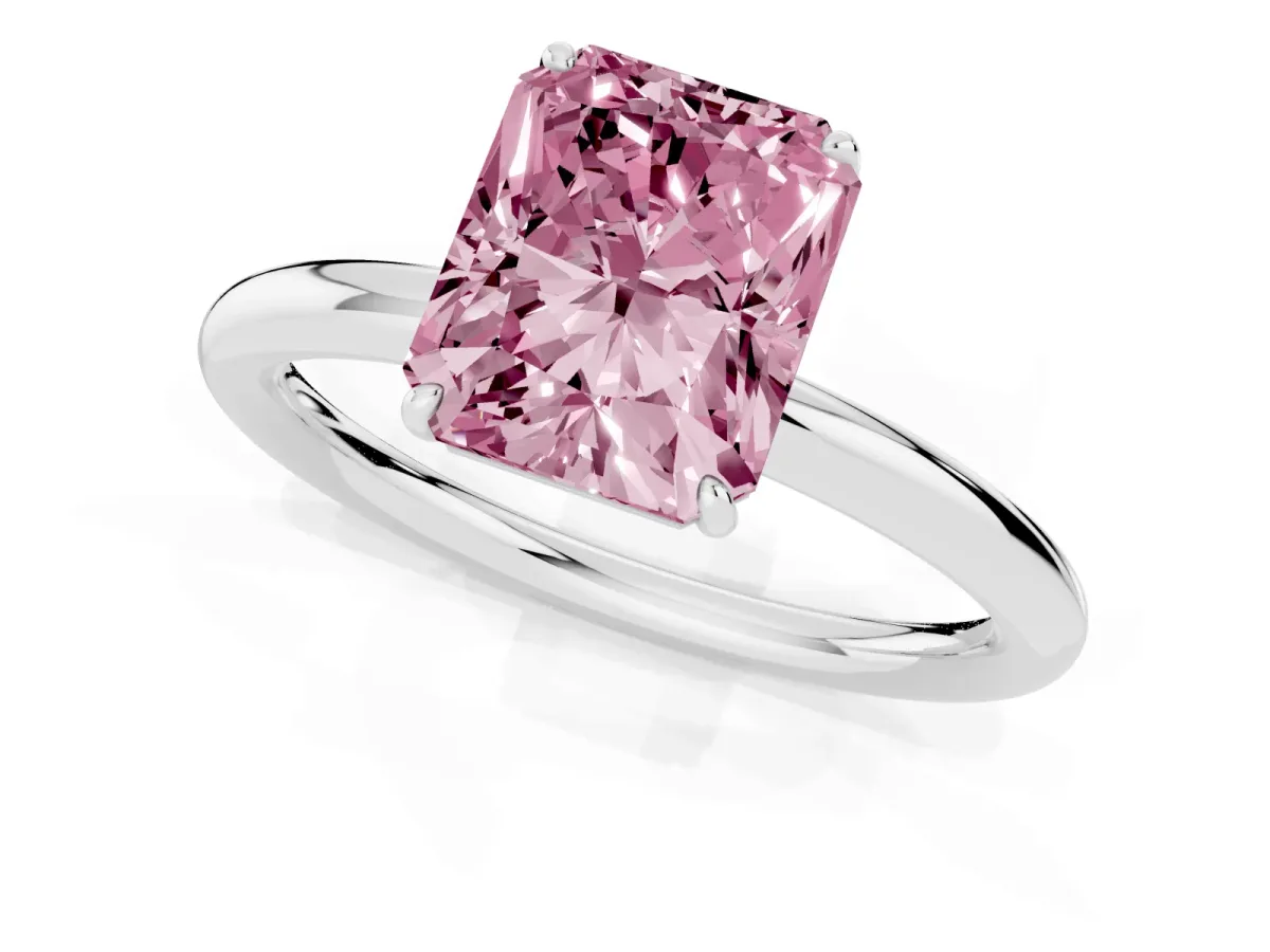 Fancy Pink Radiant Cut Solitaire Diamond Ring with Four-Prong Setting on a Plain Band Platinum