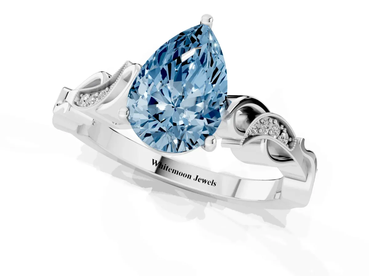 Fancy Blue Pear Cut Solitaire Vine Band with Milgrain Prong Setting Platinum