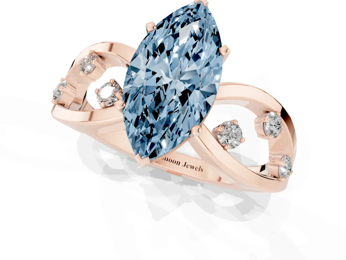 Fancy Blue Marquise Cut Cut Solitaire Diamond with Side Stones on Criss-Cross Band and Four-Prong Setting Rose gold