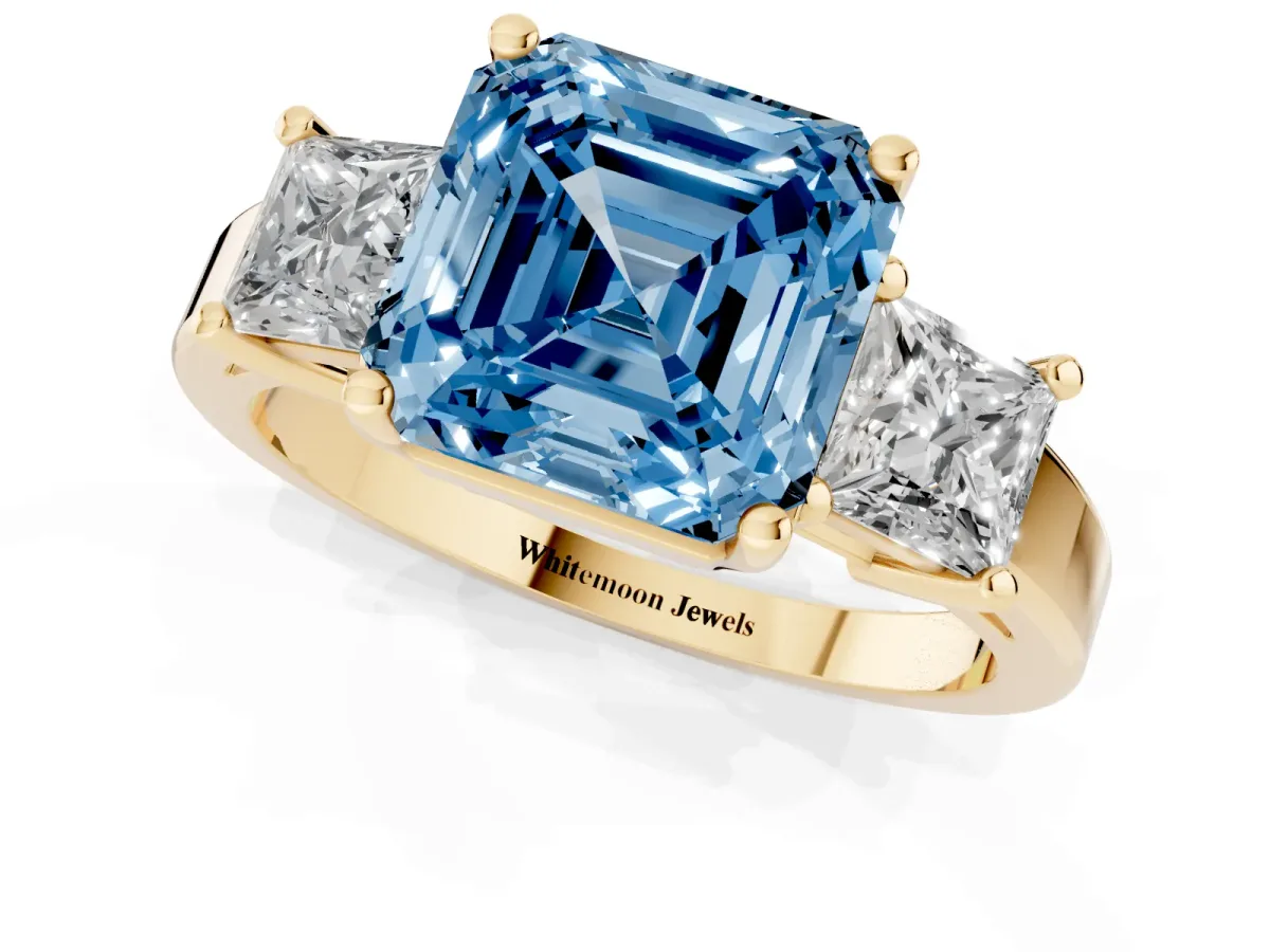 Fancy Blue Three-Stone Asscher Cut Cut Solitaire Ring with Prong Setting Yellow gold
