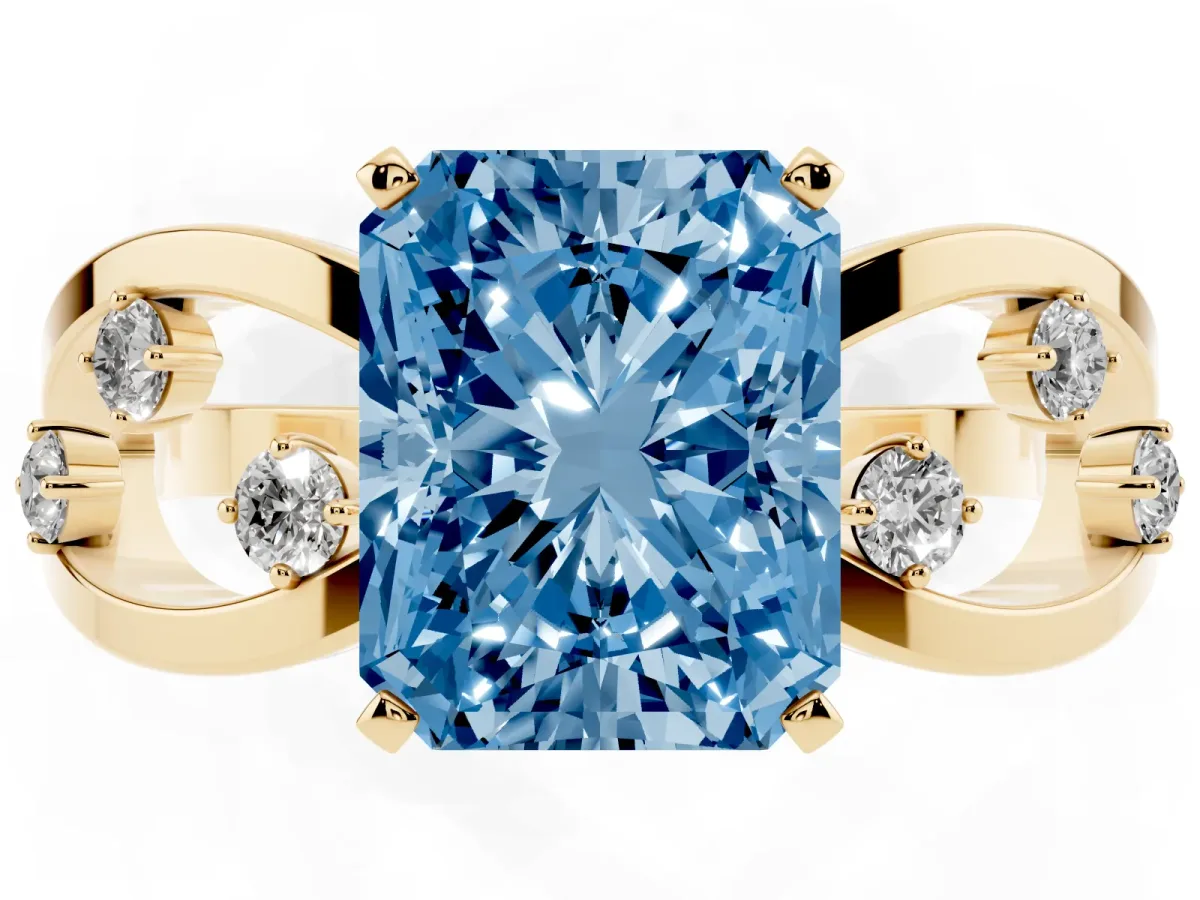 Fancy Blue Radiant Cut Cut Solitaire Diamond with Side Stones on Criss-Cross Band and Four-Prong Setting Yellow gold
