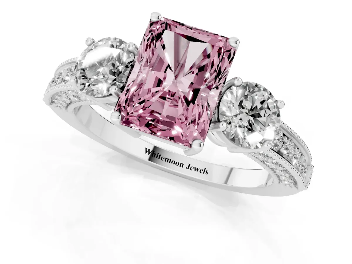 Fancy Pink Radiant Cut Three-Stone Diamond Ring with Pavé Band and Four-Prong Setting Silver