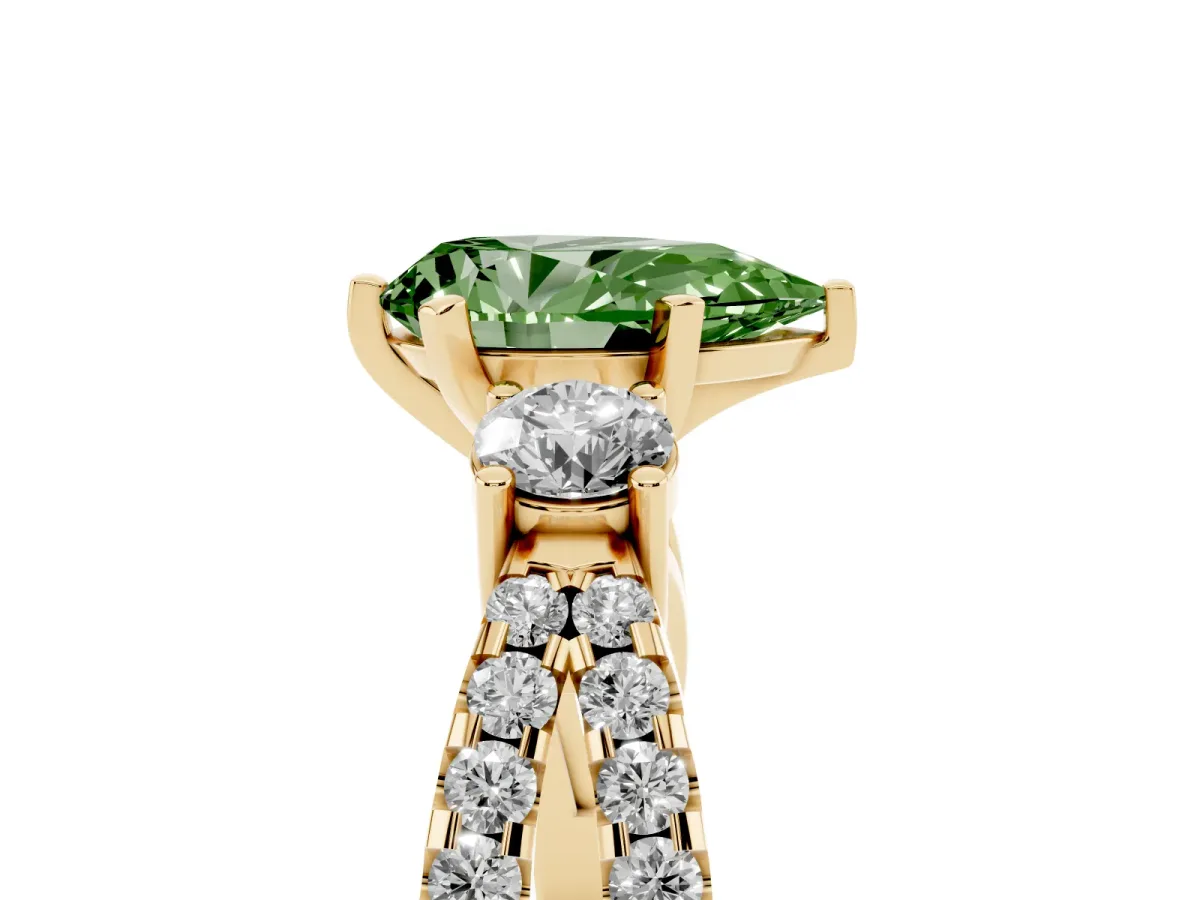 Fancy Green Pear Cut Diamond Three-Stone Ring with Pavé Split Shank and Four-Prong Setting Yellow gold