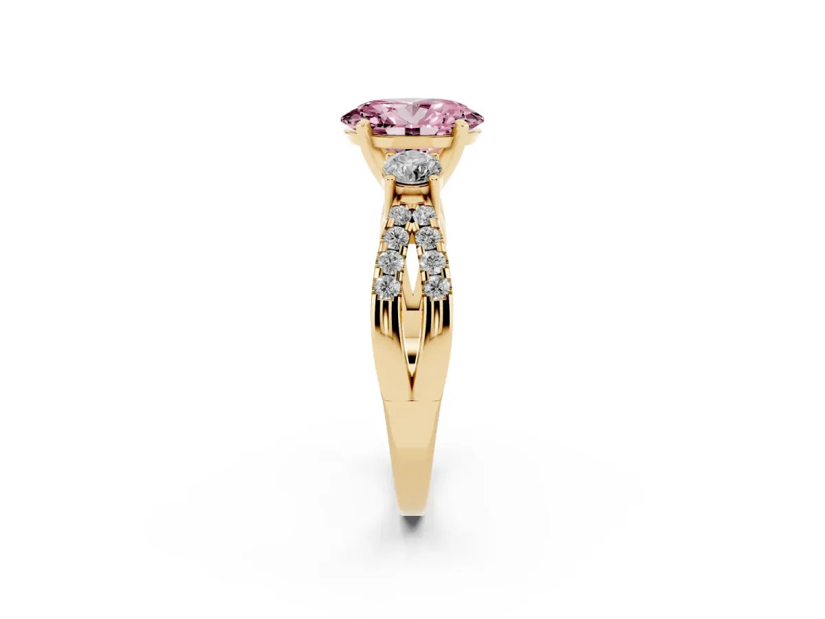 Fancy Pink Oval Cut Diamond Three-Stone Ring with Pavé Split Shank and Four-Prong Setting Yellow gold