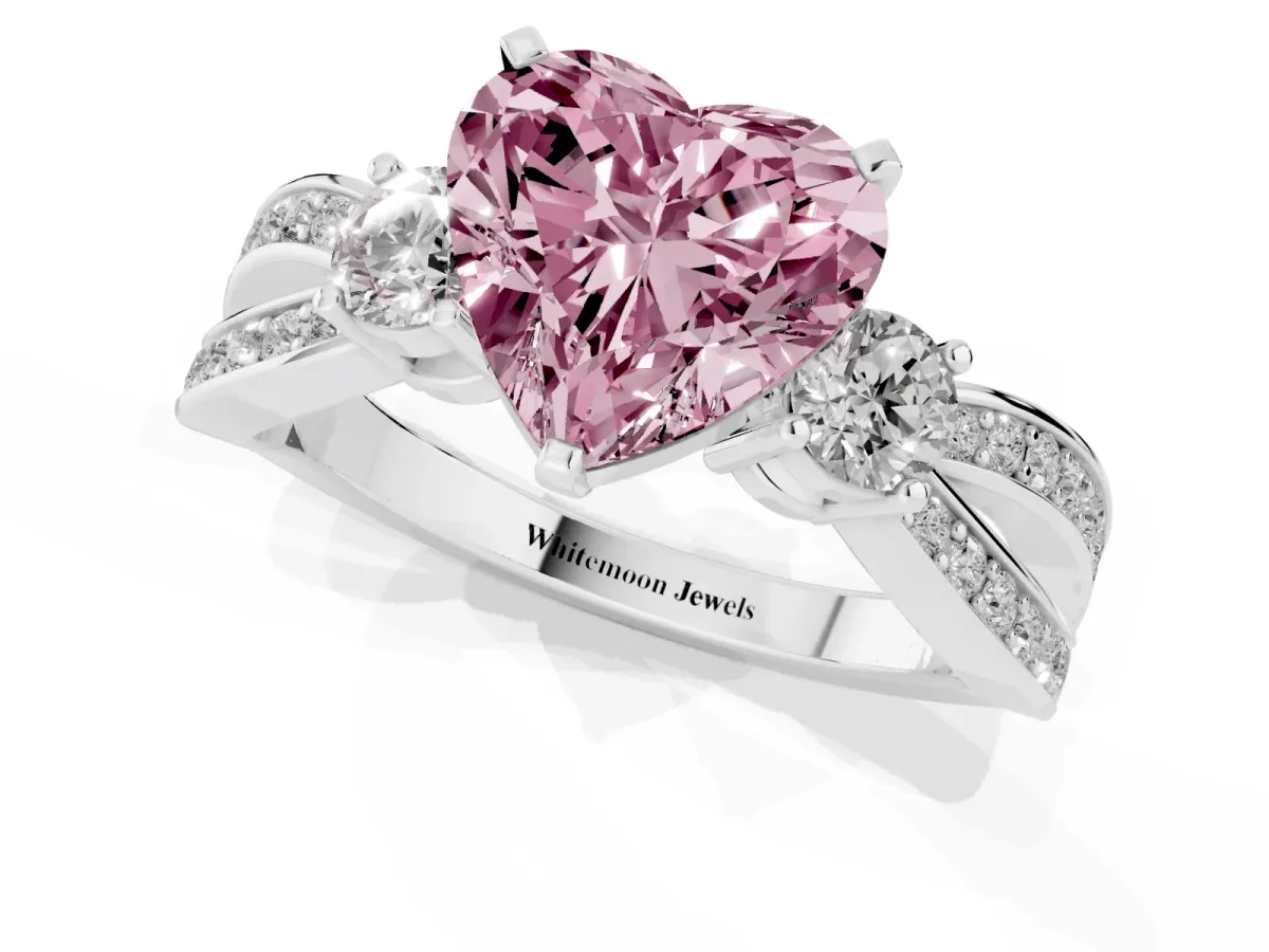 Fancy Pink Three-Stone Heart Cut Cut Diamond Twist Band with Prong Setting Silver