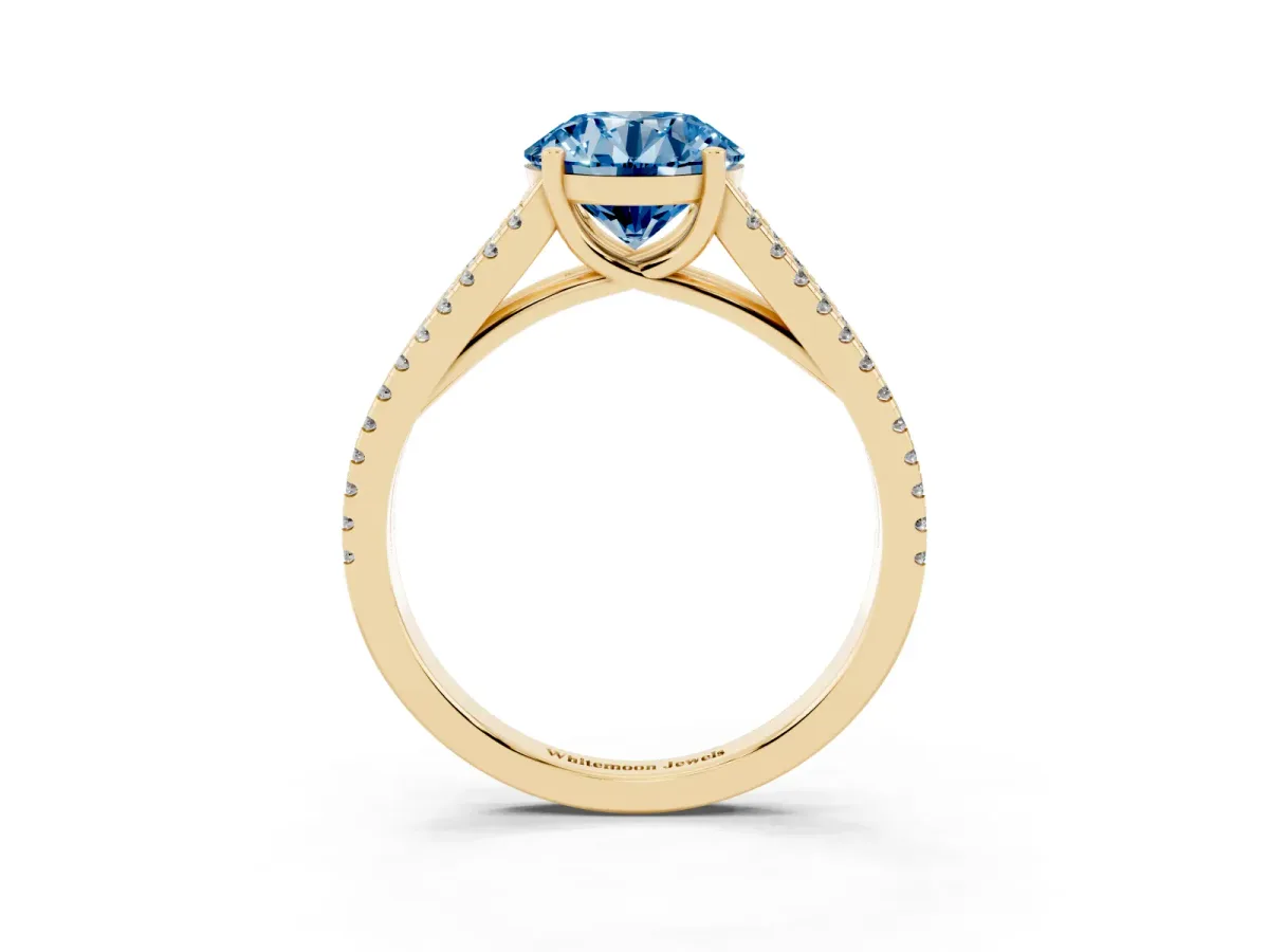 Fancy Blue Round Cut Diamond Solitaire Engagement Ring with Split Shank Pavé Band Yellow gold