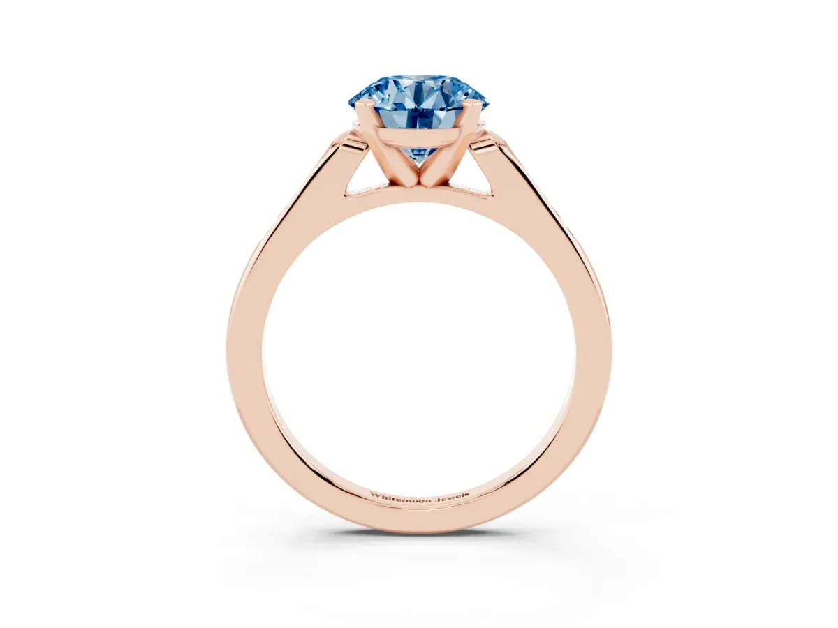 Fancy Blue Round Cut Diamond Solitaire Ring with Channel Set Round Band and Prong Setting Rose gold