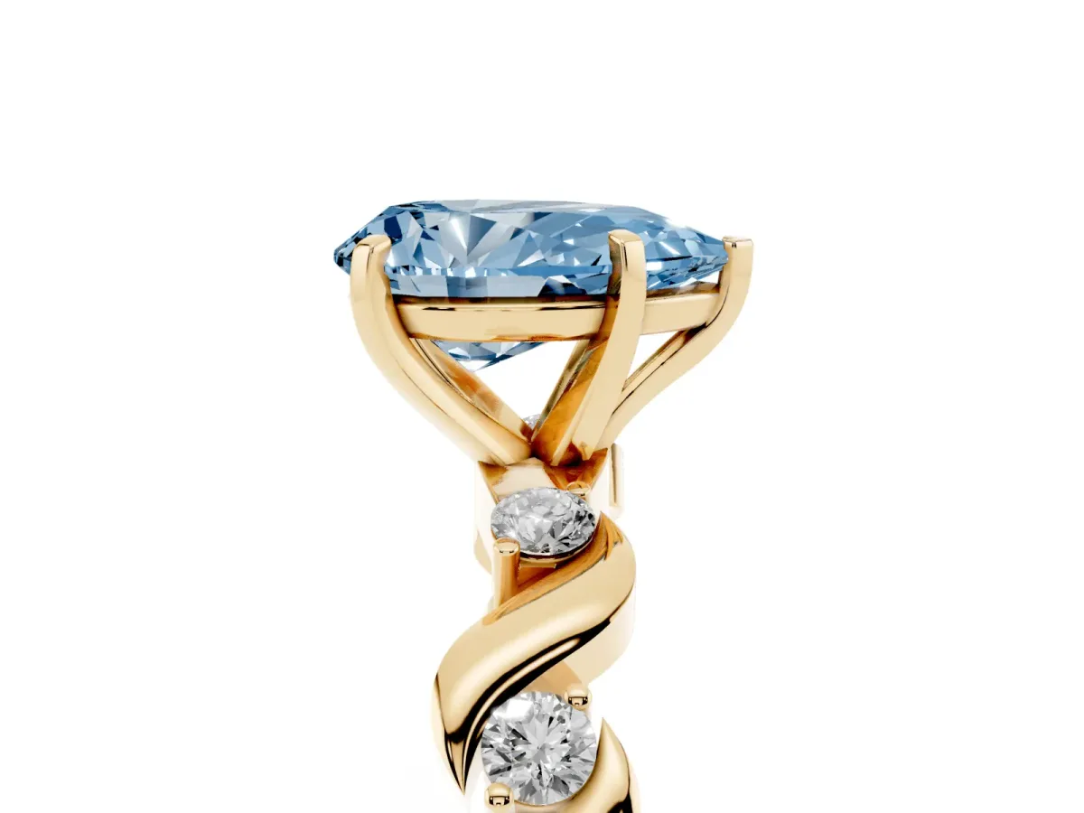 Fancy Blue Pear Cut Diamond Solitaire Twisted Band with Round Accents and Prong Setting Yellow gold