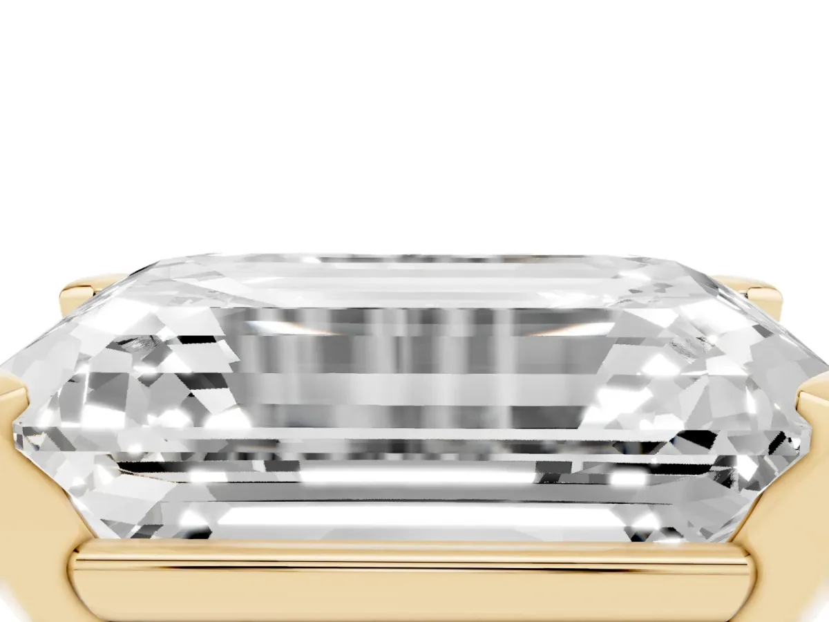 Emerald Cut Diamond Solitaire Ring with Prong Setting and Classic Band Yellow gold