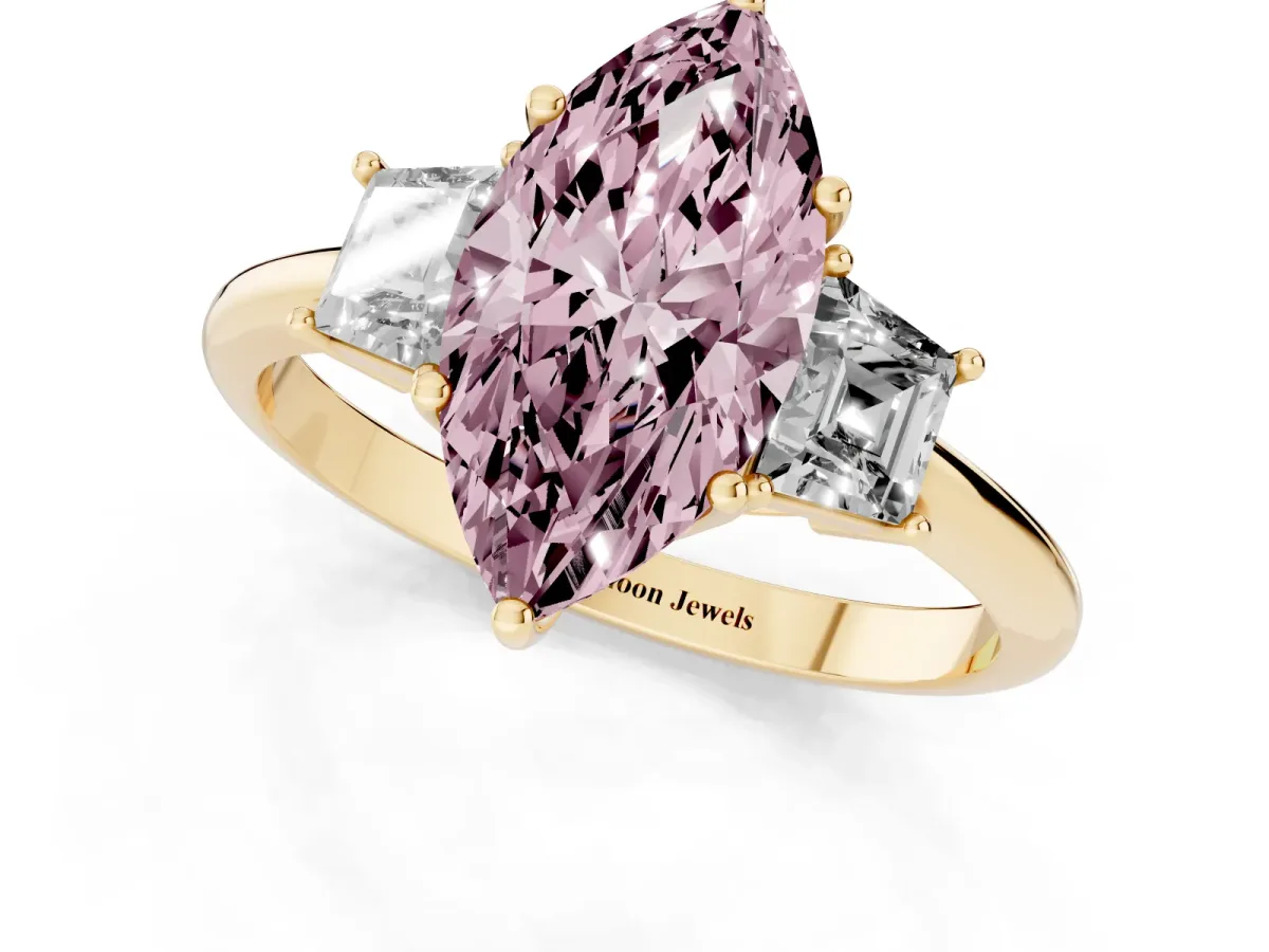 Fancy Pink Marquise Cut Diamond Three-Stone Ring with Trapezoid Side Stones and Prong Setting Yellow gold